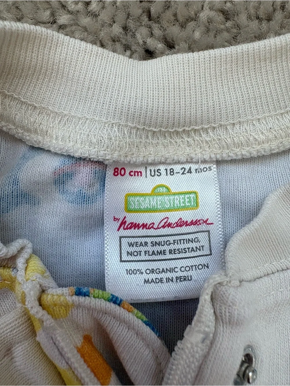 Hanna Andersson Cream Sesame Street Character One-Piece Zip Pajamas
